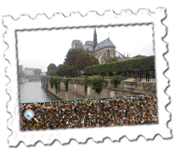 A bizarre view of Notre Dame seen from a bridge of padlocks